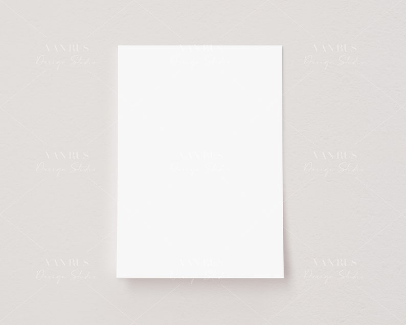 May include: A blank white card on a light gray background.