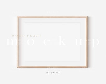 May include: A simple, light wood frame with a white mat and a white background. The frame is perfect for displaying photos, artwork, or other decorative items.  The text "WOOD FRAME" is printed in a light brown color at the bottom of the image.