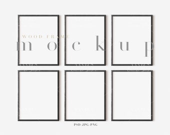 May include: Six black picture frames with white mats are arranged in a grid pattern on a white wall. The frames are all the same size and have a simple, modern design. The word "mockup" is written in gray text on the frames.