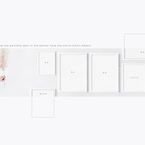 May include: A white wall with six picture frames of different sizes. The frames are all white and have a simple design. The frames are labelled with their sizes: A4, 8x10, 11x14. The frames are arranged in a row across the wall.