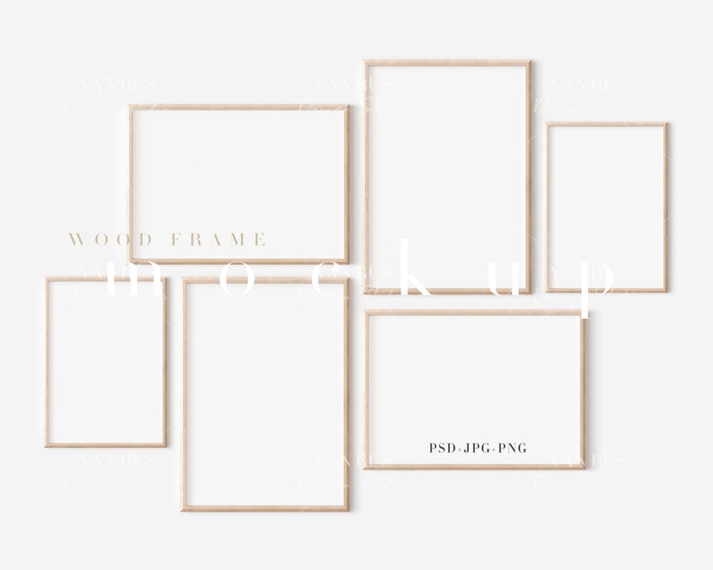 May include: Five wood frames of various sizes are arranged on a white wall. The frames are all the same color, a light brown wood. The frames are empty and ready for artwork or photos.