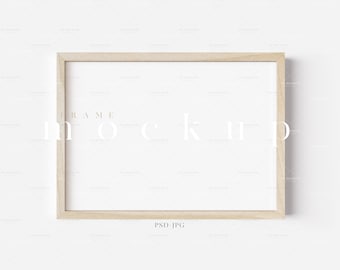 May include: A light wood frame with a white background. The frame is on a white surface. PSD JPG