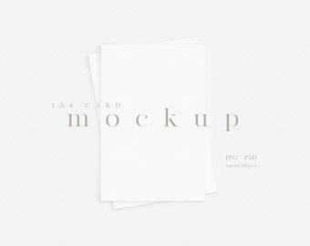 May include: Mockup of two blank white cards stacked on top of each other. The cards are 4x6 inches and are on a white background. The text "4x6 Card Mockup" is written in grey text below the cards. The text "JPG - PSD Smart Object" is written in grey text below the mockup.