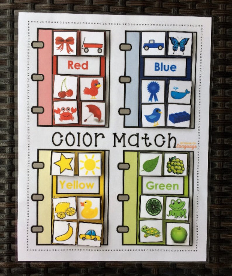 May include: A color matching game for kids. The game has four sections: red, blue, yellow, and green. Each section has a word, a picture of the color, and three other pictures that are that color.
