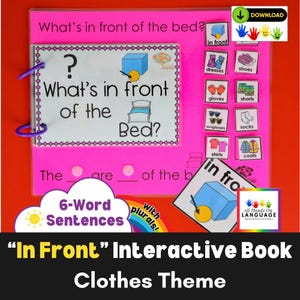 May include: A pink interactive book with the title "In Front" and the subtitle "Clothes Theme." The book features illustrations of clothing items and questions about their placement. The cover includes the text "What's in front of the bed?"
