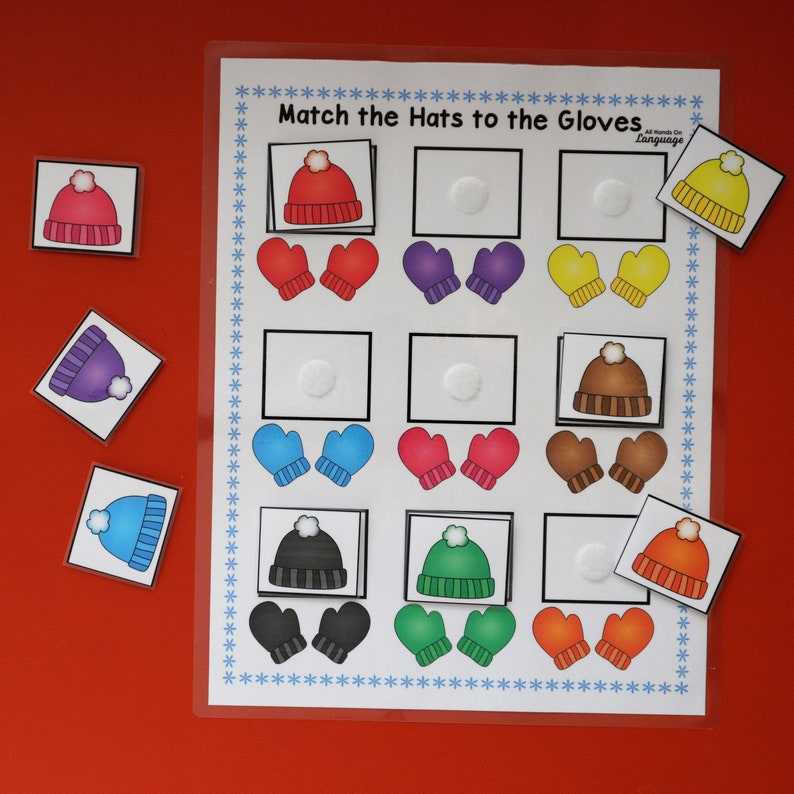 Puede incluir: Un juego educativo infantil titulado "Combina los sombreros con los guantes", con ilustraciones de gorros y guantes de invierno. El juego presenta pares de sombreros y guantes a juego en colores como rojo, morado, azul, amarillo, marr&oacute;n, verde, negro y naranja.