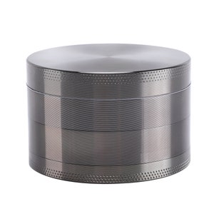 May include: A four-piece metal grinder with a silver finish. The grinder has a textured top and bottom.