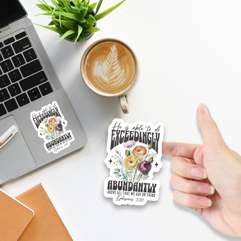 May include: Two stickers with a floral design and the text "He is able to do exceedingly abundantly above all that we ask or think Ephesians 3:20".