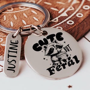 Custom Name Cute But Feral Funny Racoon Keychain Gift For Her Best Friend Gift For Sister Housewarming Girl Bestie Present