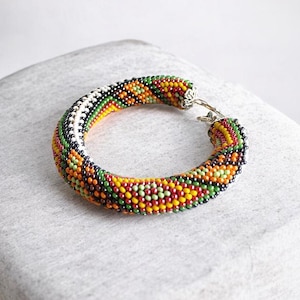 Handmade ethnic orange green bead bracelet Ukrainian tradition bead bracelet Beadwork Jewelry folk style Bead Crochet rope gift idea for her
