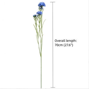 May include: A single stem of artificial blue cornflowers with green leaves. The stem is 27.6 inches long.