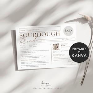 May include: A white and gold sourdough bread label with the text "SOURDOUGH bread" and product details. Includes a space for a logo and the text "EDITABLE IN CANVA". The label also lists ingredients and best-by information.