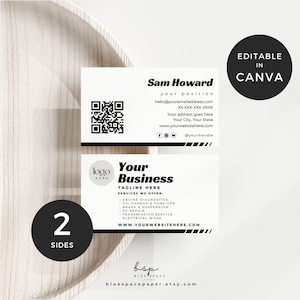 May include: Two-sided business card design with a minimalist aesthetic. The top card features the name "Sam Howard" and contact details. The bottom card displays "Your Business" and a list of services. Includes a "2 SIDES" graphic and "Editable in Canva" text.