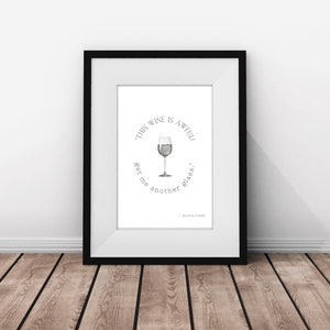 K&ouml;nnte beinhalten: Schwarzwei&szlig;es gerahmtes Druckbild mit dem Text "Dieser Wein ist schrecklich. Bring mir ein anderes Glas." und einer Zeichnung eines Weinglases.