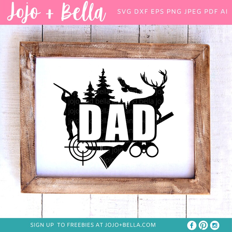 May include: A framed black and white graphic with the word "DAD" in bold letters. The design includes silhouettes of a hunter, trees, an eagle, a deer, a target, an axe, and binoculars. The frame is made of light brown wood.