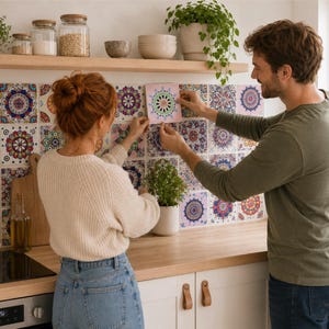 May include: A set of square adhesive tile stickers featuring intricate, colourful mandala patterns in shades of blue, red, purple, and green. These decorative decals are designed to be applied to kitchen wall surfaces to create a patterned backsplash.