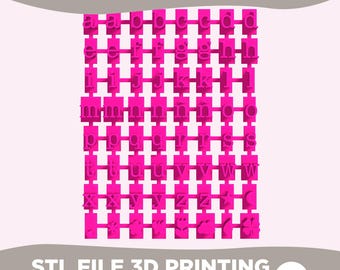 May include: A bright pink 3D printing file set featuring the lowercase alphabet letters from a to z, arranged in a grid on rectangular bases. The set includes additional symbols like a star, moon, flower, and clover, labeled as ALPHABET.