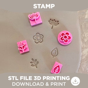 May include: A set of six pink 3D printed stamps with floral and leaf designs. The stamps are on a light pink surface. The text "STAMP" is at the top of the image. The text "STL FILE 3D PRINTING DOWNLOAD & PRINT" is at the bottom of the image.