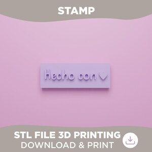 May include: A light purple stamp with the words "Hecho con" and a heart symbol. The word "STAMP" is at the top. The bottom of the image has the text "STL FILE 3D PRINTING DOWNLOAD & PRINT".
