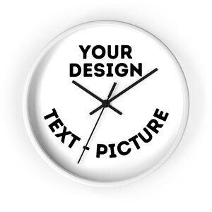 May include: White round clock with black hands and the text "YOUR DESIGN" at the top, "TEXT" at the bottom left, and "PICTURE" at the bottom right.