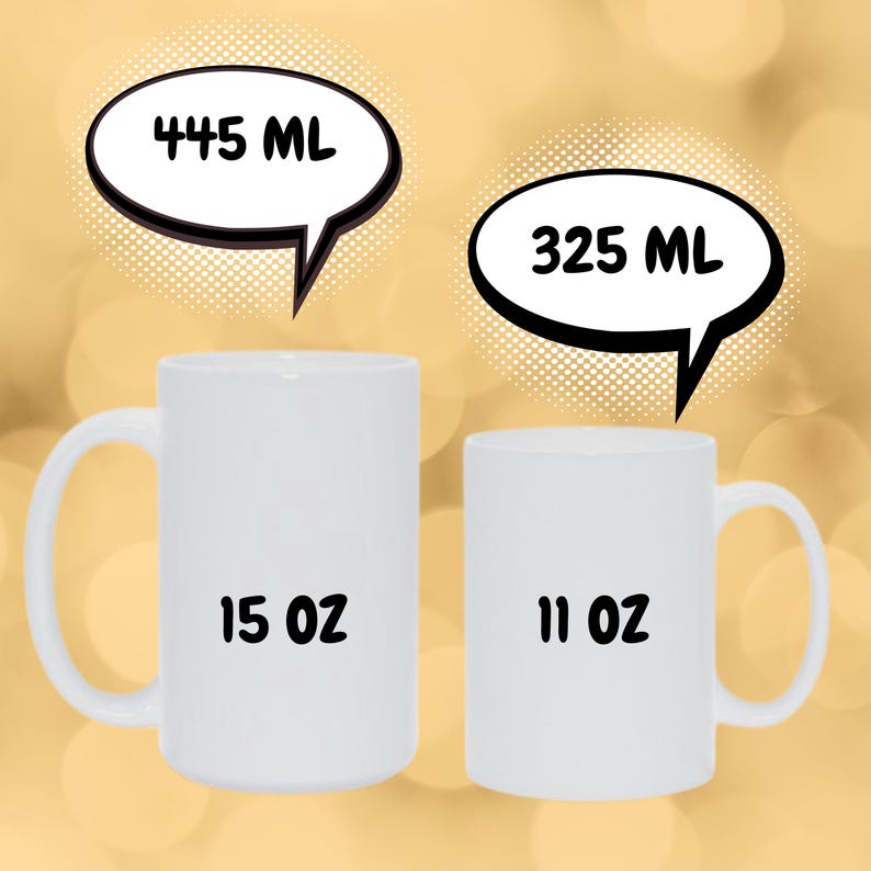 May include: Two white ceramic mugs with black text. The larger mug is 15 oz and 445 ml. The smaller mug is 11 oz and 325 ml.