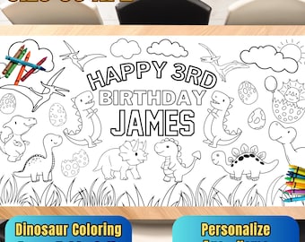 May include: A black and white dinosaur-themed colouring tablecloth with the text "Happy 3rd Birthday James". The tablecloth is 76 cm by 183 cm.