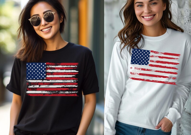 May include: Black t-shirt and white long-sleeve shirt featuring a distressed American flag design. The flag has a blue field with white stars and red and white stripes. The shirts are casual wear.