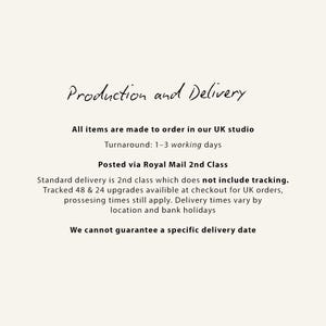 May include: Cream-colored background with the text "Production and Delivery" in elegant script. The text below details the production process, including turnaround time and shipping information. The text also mentions that items are made to order in the UK.