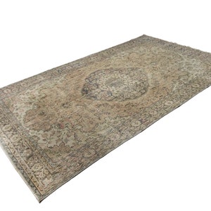 6x10 ft large vintage oushak rug, handmade mid-century oushak area rug, oushak rug with floral motifs, oushak rug for living room