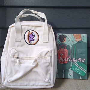 heartstopper mini backpack volume 3: 9781444952773: Oseman, Alice: Books Alice Oseman Product Details Hard enamel with silver metal finish Matching charm Charlie Spring Backpack Size :