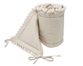 beige crib bumper