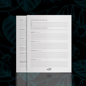 May include: A weekly planner with a black and white design. The planner includes sections for Friday, Saturday, Sunday, Monday, Tuesday, Wednesday, and Thursday. It also includes sections for "My Main Goals This Week Are:", "My Intention For This Week Is:", "Overall, How Was This Week?", "Things That Went Well", and "Next Week I'm Looking Forward To".