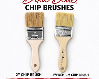 May include: Two Dixie Belle chip brushes with light wood handles and metal ferrules. One is a 2-inch chip brush, the other a 2-inch premium chip brush. Text reads: Dixie Belle CHIP BRUSHES, 2" CHIP BRUSH, 2" PREMIUM CHIP BRUSH, CHOOSE YOUR BRUSH.