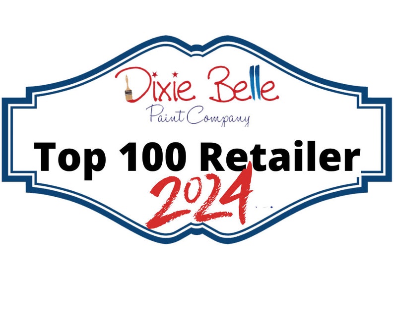 Op de afbeelding: Een blauwe en witte awardplaquette met de tekst "Dixie Belle Paint Company" en "Top 100 Retailer 2024".
