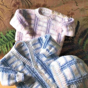 May include: A set of knitted baby clothes in blue and white stripes, including a cardigan, a hat, and a sweater in a pink and white striped pattern.