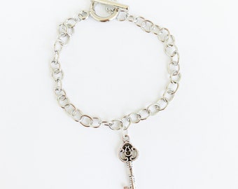Pulsera con dijes de Jeremías tsitp