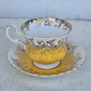 Royal Albert Regal Series Yellow Gold Footed Fine China Teacup and Saucer