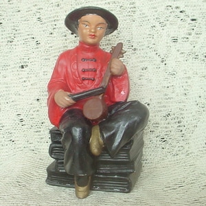 Vintage MIDCENTURY Asian Man Musician on Books Hand Painted Porcelain Figure 5-1/2&quot;