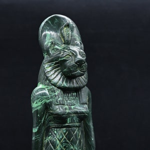 statue of the warrior goddess Sekhmet Goddess of war green stone ancient Egypt altar made in Egypt