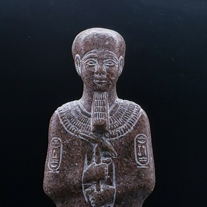 statue of Ptah Sculpture god of Memphis, and craftsmen granite stone heavy stone made in Egypt