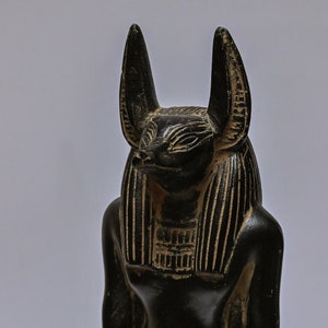 statue of Ancient Egyptian God Anubis dark stone made in Egypt