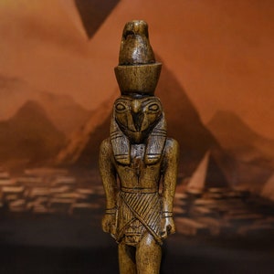 Statue of the Egyptian god Horus, the god of protection, made of natural stone by carving, made in Egypt