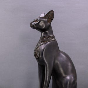 unique goddess Bastet cat large statue black with scarab on her chest, symbols hieroglyphic inscriptions around the base made in Egypt
