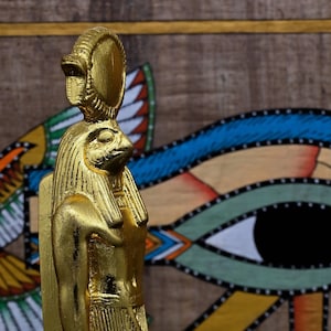 Statue of Ra Harakhte Sun God crowned with a solar disk gold leaf made in egypt