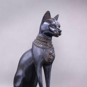 unique statue goddess cat Bastet large black with beautiful details scarab on her head and winged on chest with eye of Horus made in Egypt