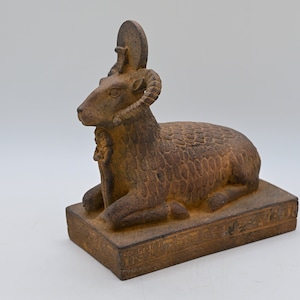 Egyptian statue of the god Khnum in the form of a ram, made of natural stone, made in Egypt