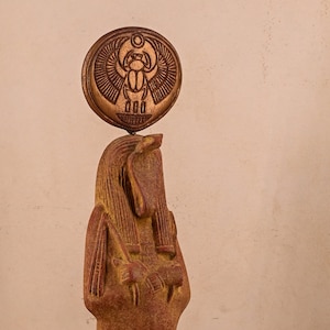 Unique statue of Egyptian Meretseger, an ancient Egyptian cobra headed goddess. Based on New Kingdom tomb paintings