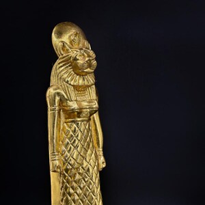 statue of Sekhmet warrior goddess of war heavy stone gold leaf made in Egypt