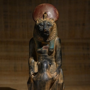 Unique seated statue of the goddess Sekhmet, the goddess of war and energy, a heavy stone made by hand/Egyptian antique_home
