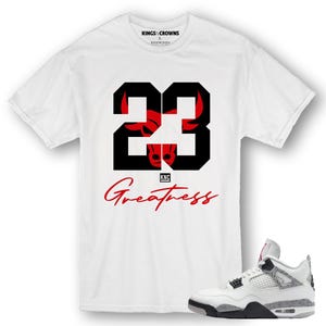 Kings N Crowns Tee shirt to match Jordan 4 White Cement Sneakers. 23